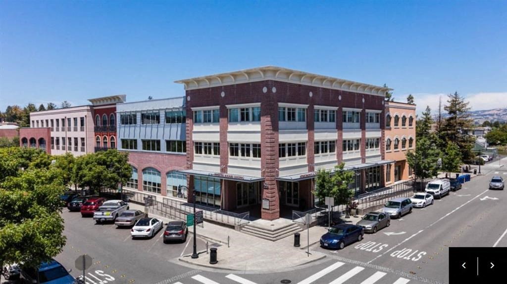 a building on the corner of a city street