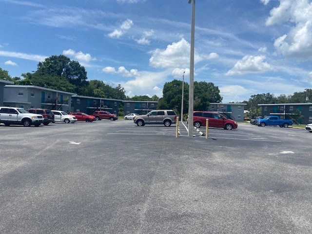 a parking lot with cars parked in it