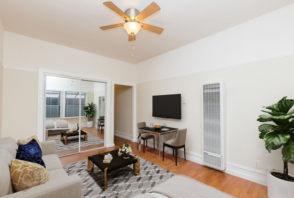 a living room with a couch and a tv