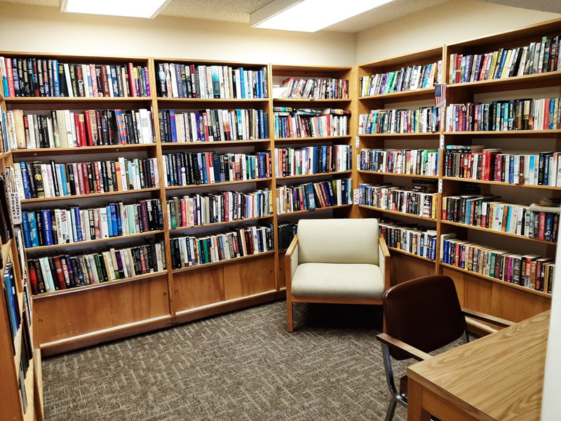 the library is full of books and chairs