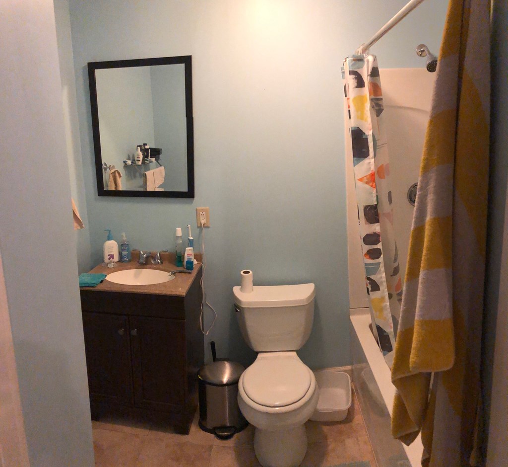 a small bathroom with a toilet and a sink