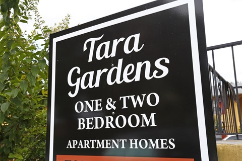 A sign for Tara Gardens one and two bedroom apartments.