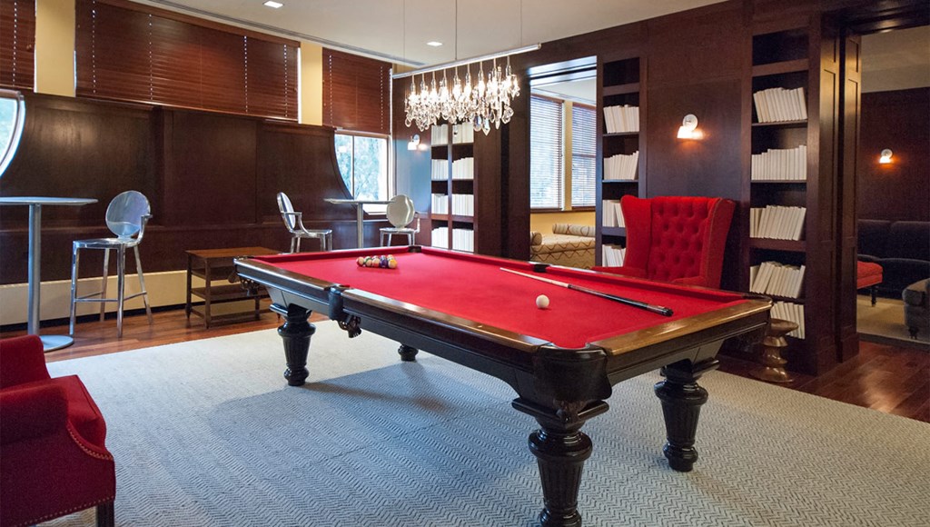 Newark Apartments for Rent-Eleven80 Apartments Game Room With Seating And Billiards Table