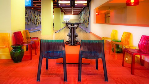 Bowling alley with tables and chairs