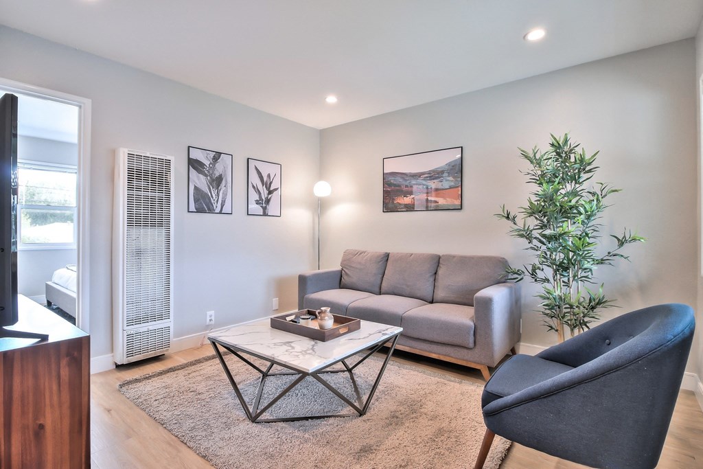 a living room with a couch and a coffee table