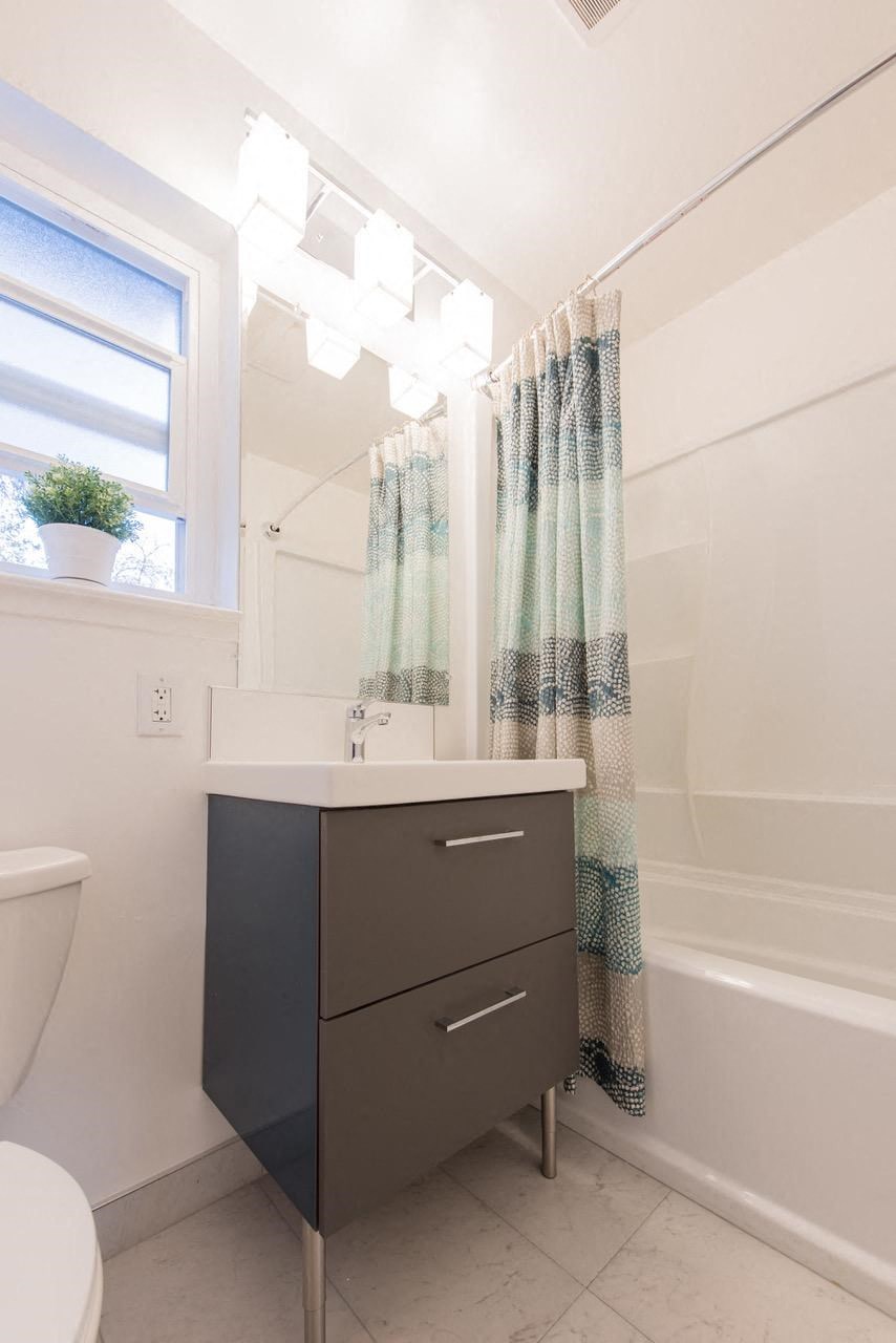 a bathroom with a sink and a toilet