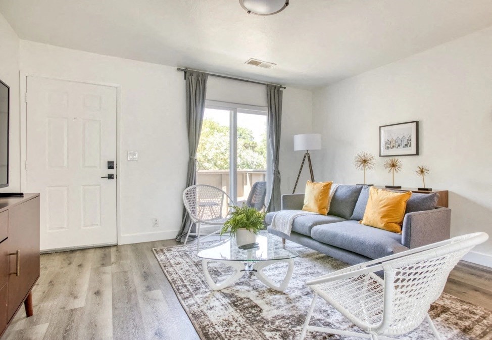 a living room with a couch and a table