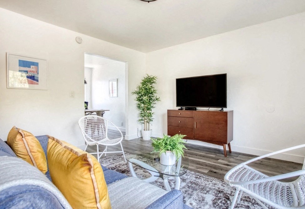 a living room with a couch and a television
