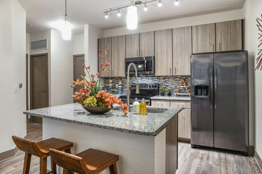 Kitchen at Centre Pointe Apartments in Melbourne, FL - Photo Gallery 1