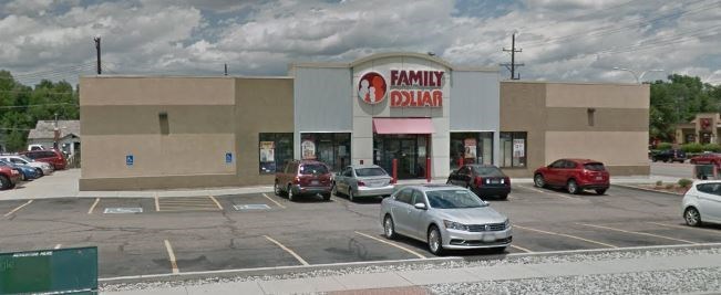 A Family Dollar store with cars parked in front.