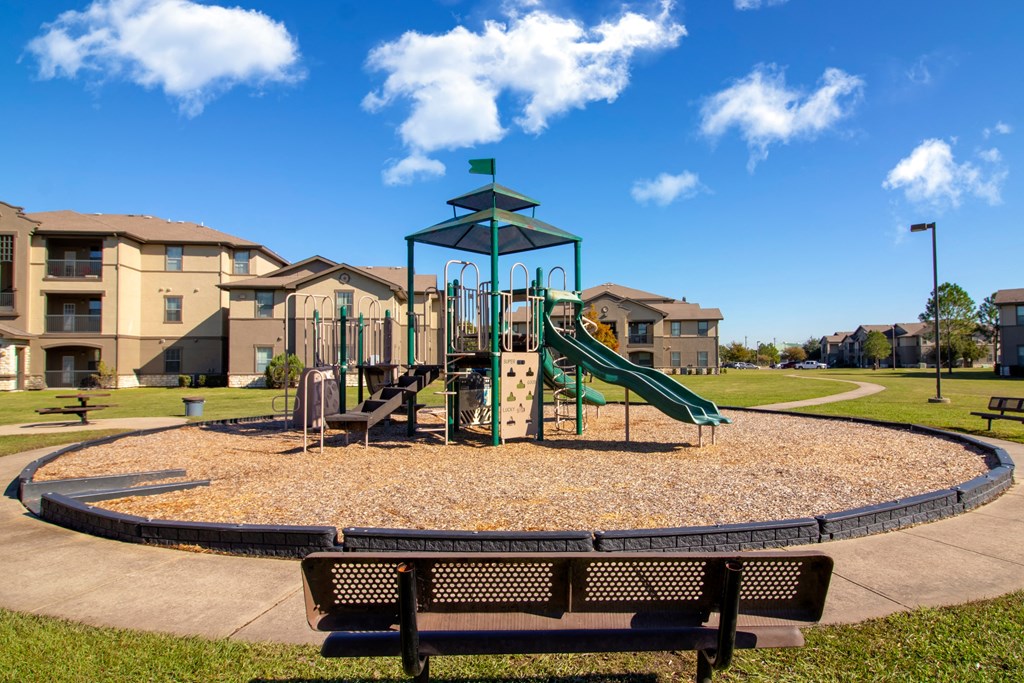Rosemont at Mayfield Villas Apartments Outdoor Playground and Bench
