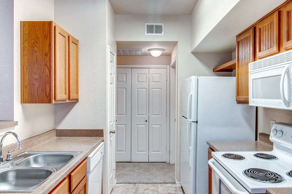 Rosemont at Mayfield Villas Apartments Kitchen Sink, Counters, and Appliances
