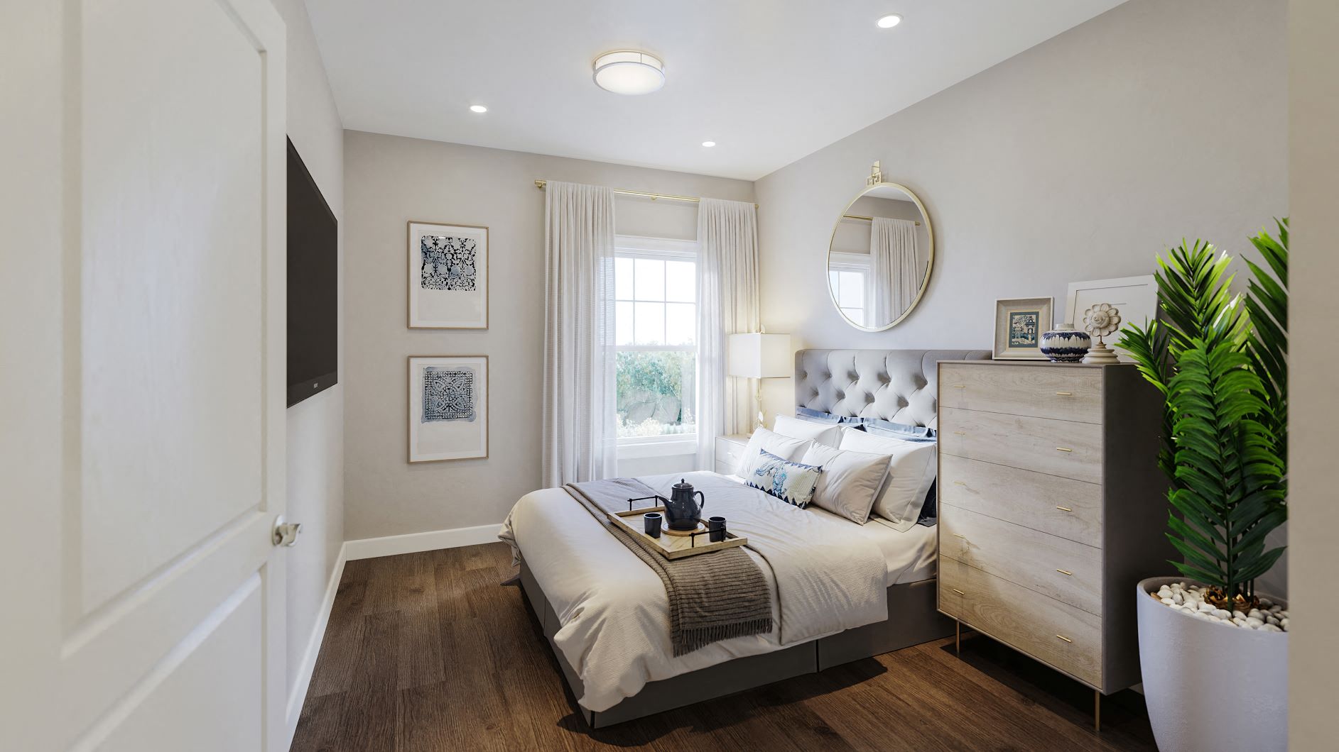 a bedroom with a bed and a dresser