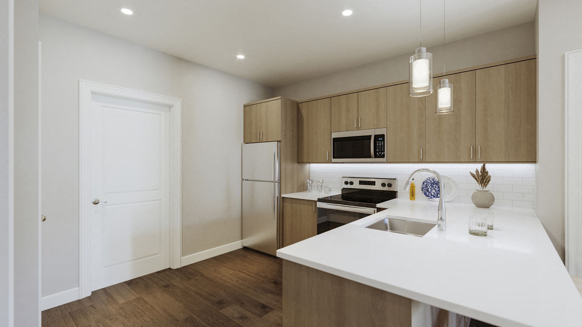 a kitchen with a white counter top and a sink