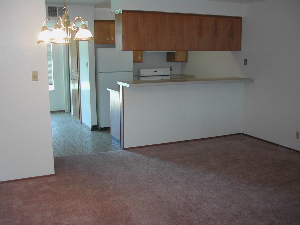 a view of the kitchen and dining room from the living room