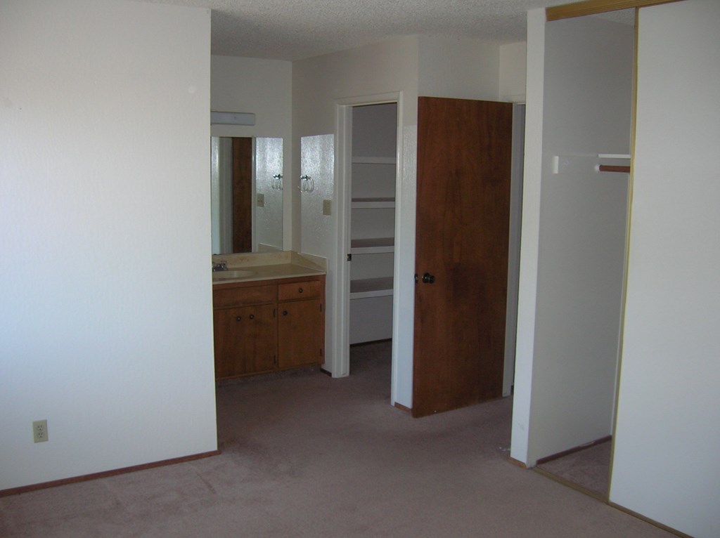 a view of the master bathroom from the living room