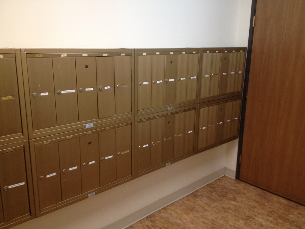 the lockers in the locker room are lockers with doors