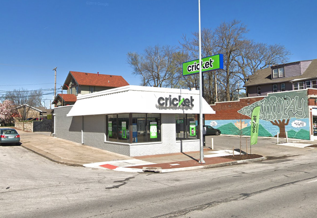 a city gas station on the corner of a street