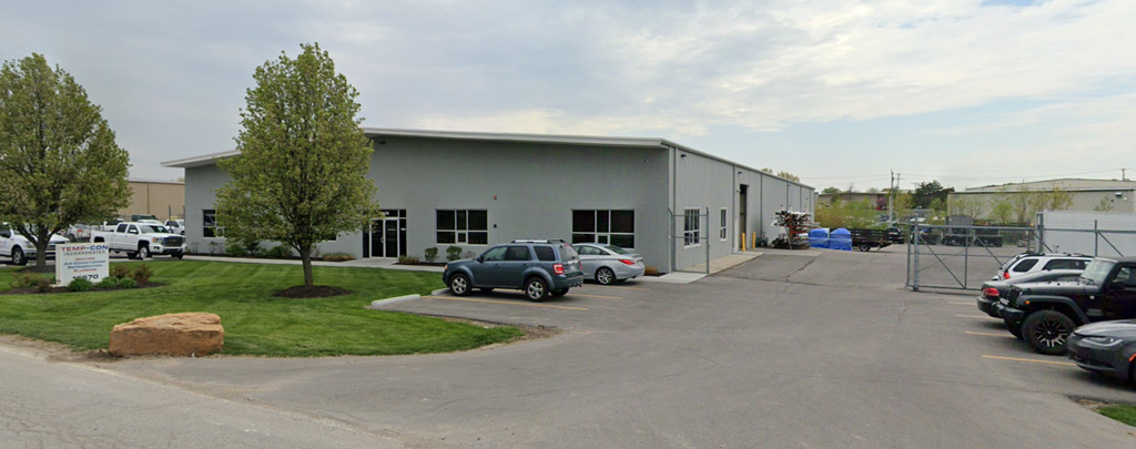 a building with cars parked outside of it