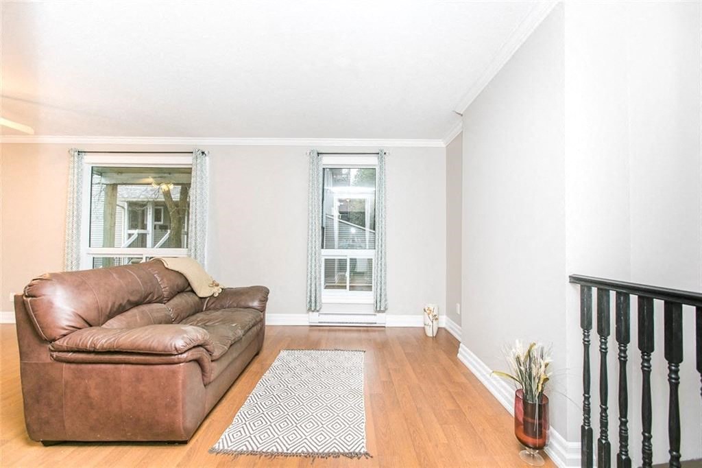 a living room with a couch and a window