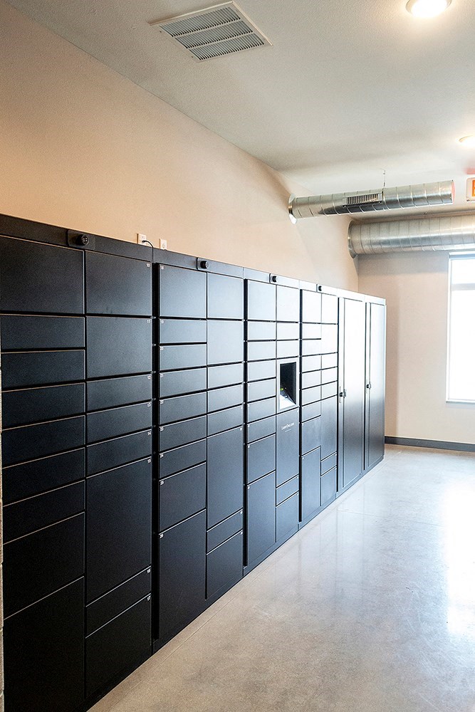 a row of lockers in a room with a window