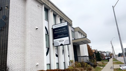 a building with a sign in front of it