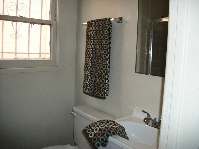 a small bathroom with a sink and a toilet