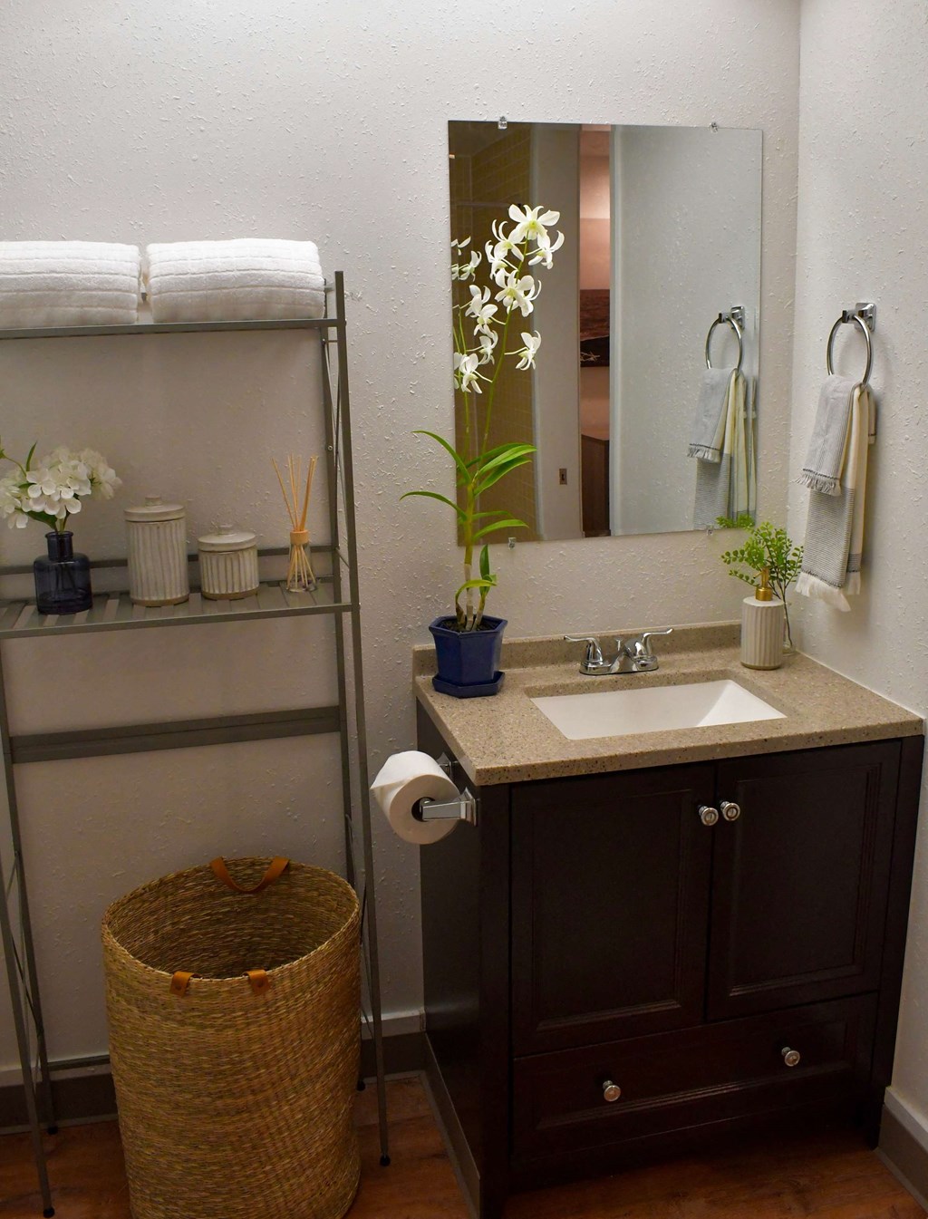 a small bathroom with a sink and a mirror