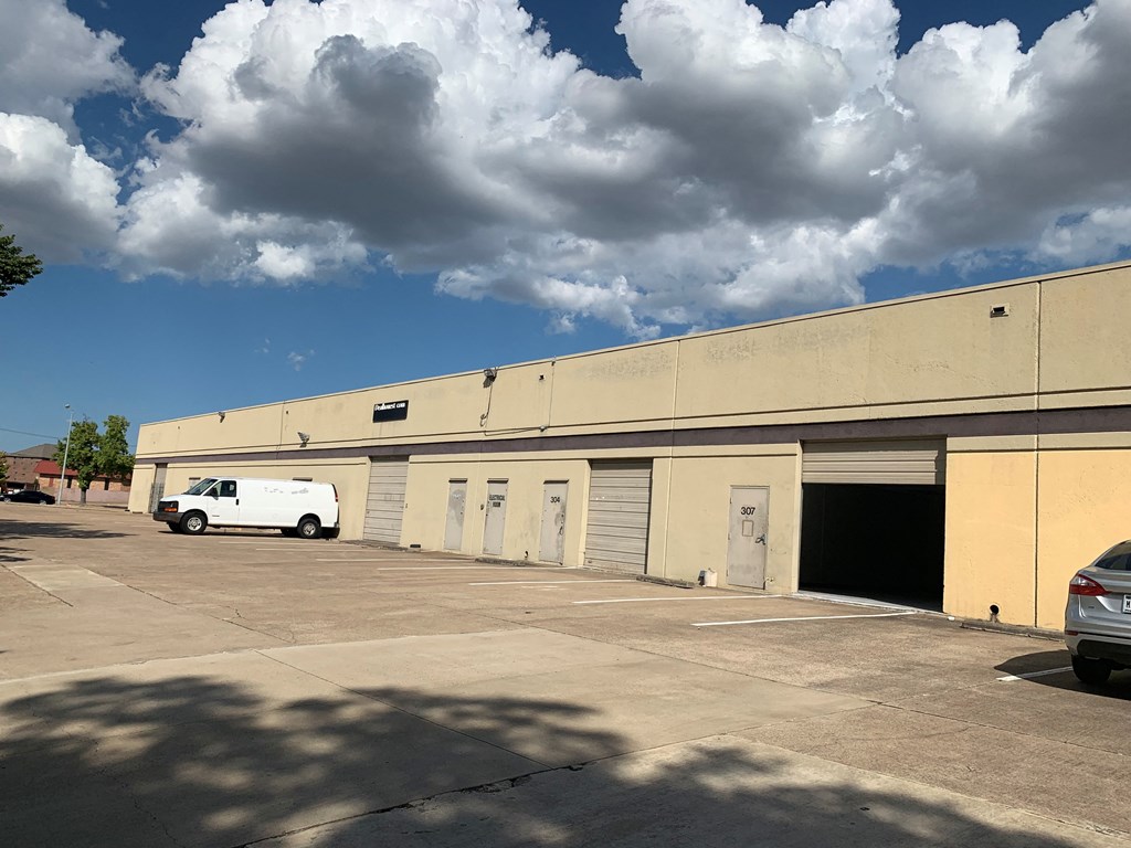 a building with a van parked outside of it