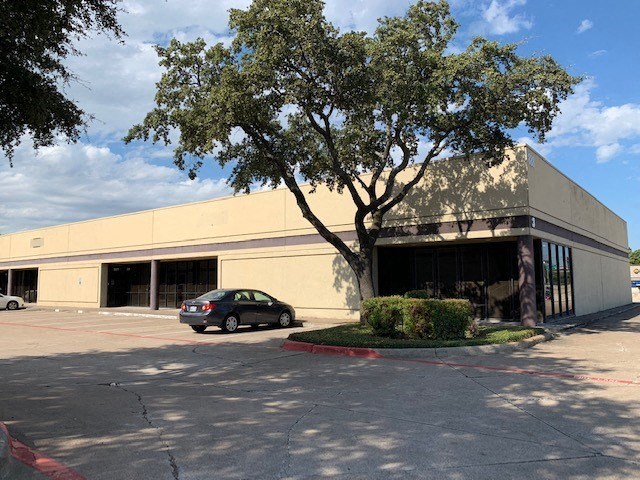 a building with a car parked outside of it