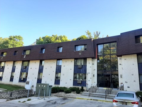a large building with a car parked in front of it