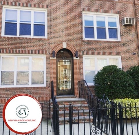 a photo of a brick house with a red circle on it