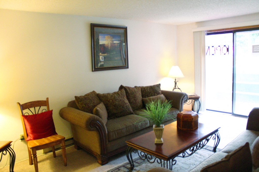 a living room with a couch and a coffee table