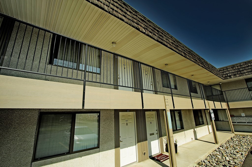 a large building with glass doors and windows