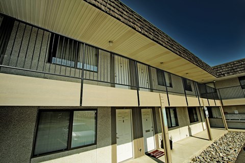 a large building with glass doors and windows