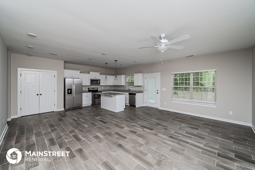 the kitchen and living room are spacious and ready for you to use