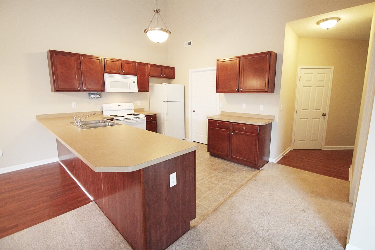 spacious updated kitchen with vaulted ceiling