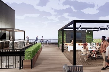 Quarter Phase II features a rooftop deck with lake and city views, bar and community dining area. - Photo Gallery 9