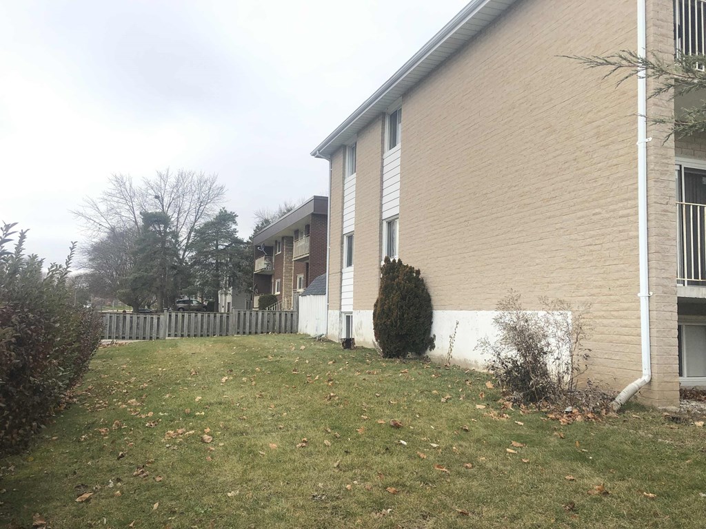 a building with a yard in front of it