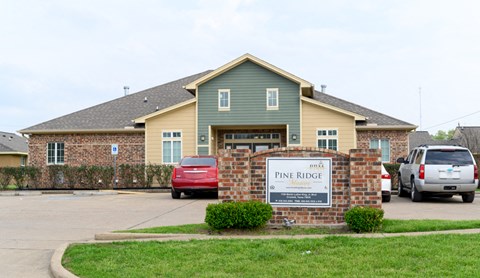 a house with a sign that says pine ridge