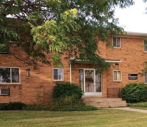 A brick building with a sign that says "Elementary" on it.