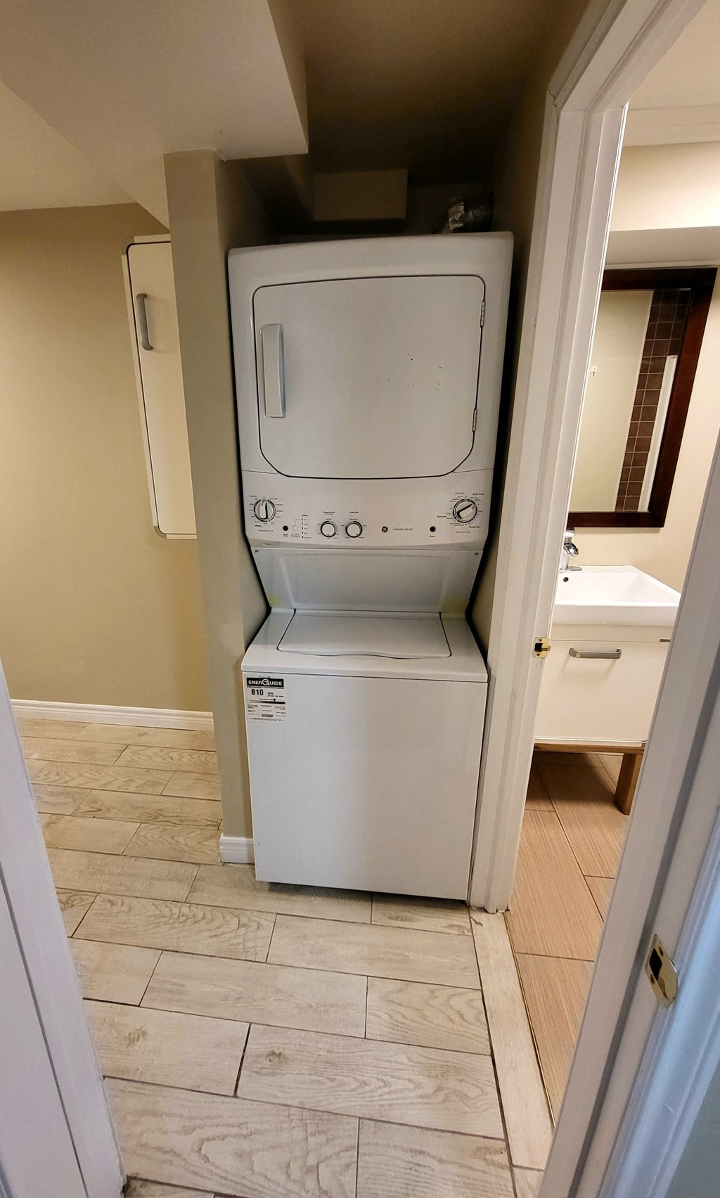 the laundry room has a washer and dryer in it