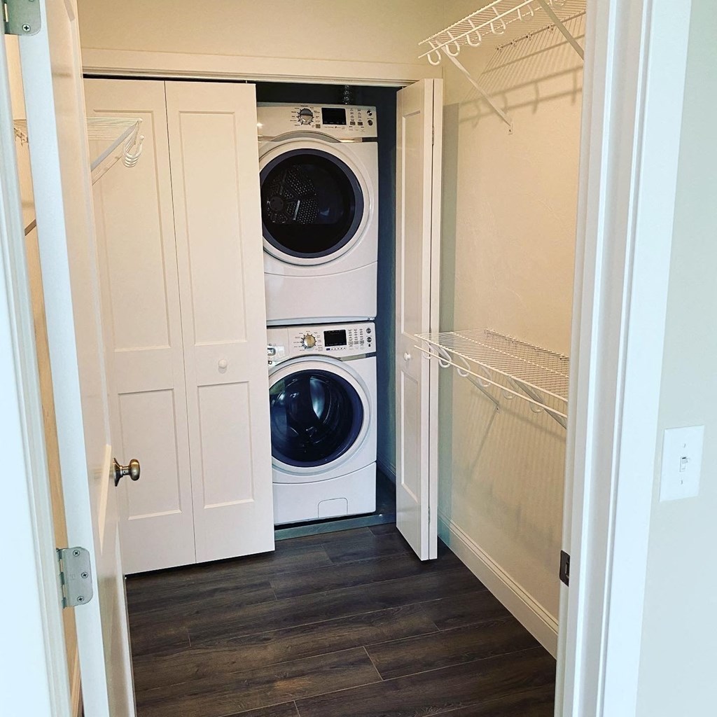 a small laundry room with a washer and dryer in it
