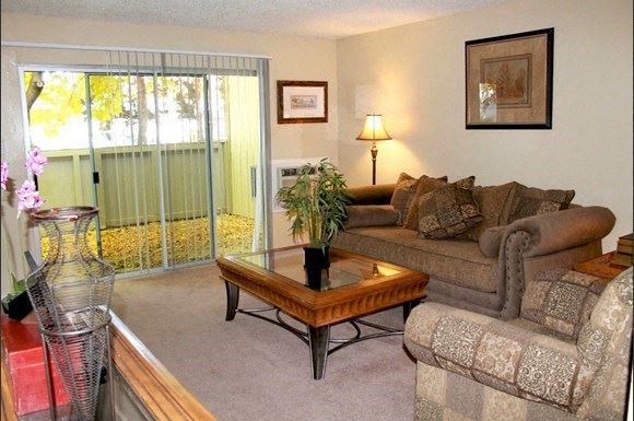 a living room with a couch and a table