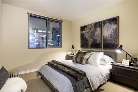 primary bedroom with large bed at Wilshire Vermont, Los Angeles, CA