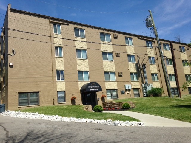 a large building with a sign in front of it