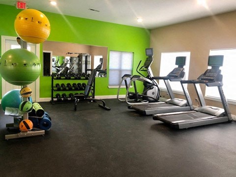 a gym with weights and other exercise equipment