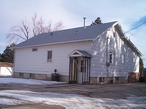 an old with a gray roof