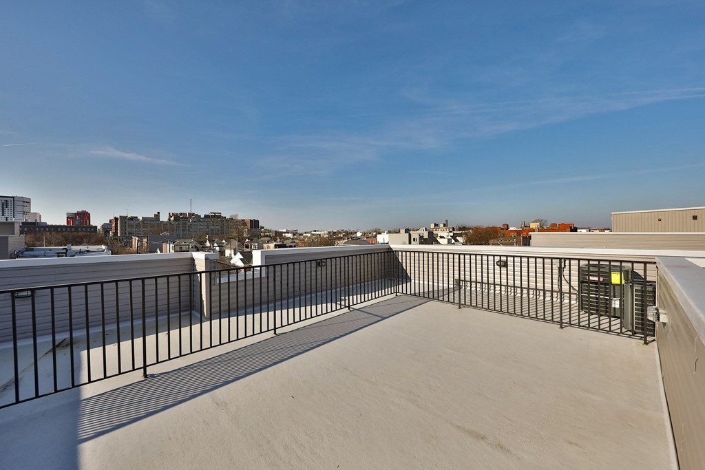 the views of the city from the roof deck of a building