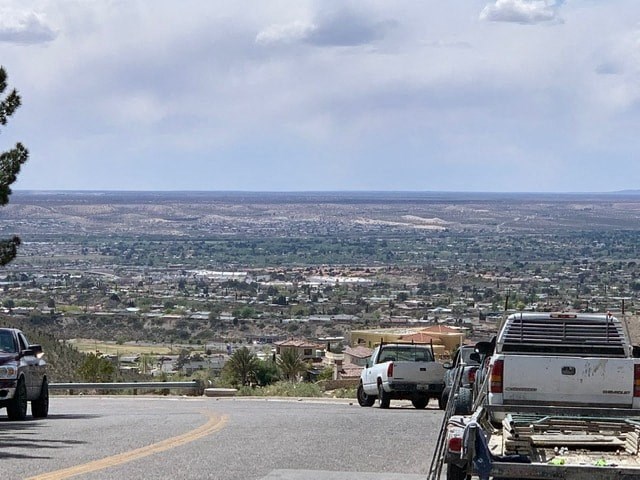 a group of cars parked on the side of a road